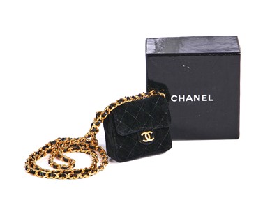 Lot 177 - A Chanel micro-mini quilted velvet handbag-necklace, circa 1987