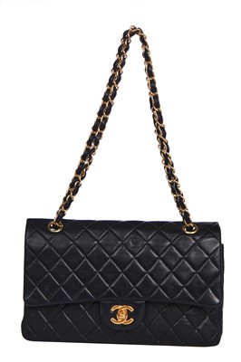 Lot 178 - A Chanel quilted black lambskin leather classic double flap bag, 2000-2002