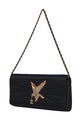 Lot 175 - A Chanel sun-beam quilted black satin evening bag, Spring-Summer 2001