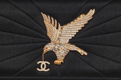 Lot 175 - A Chanel sun-beam quilted black satin evening bag, Spring-Summer 2001