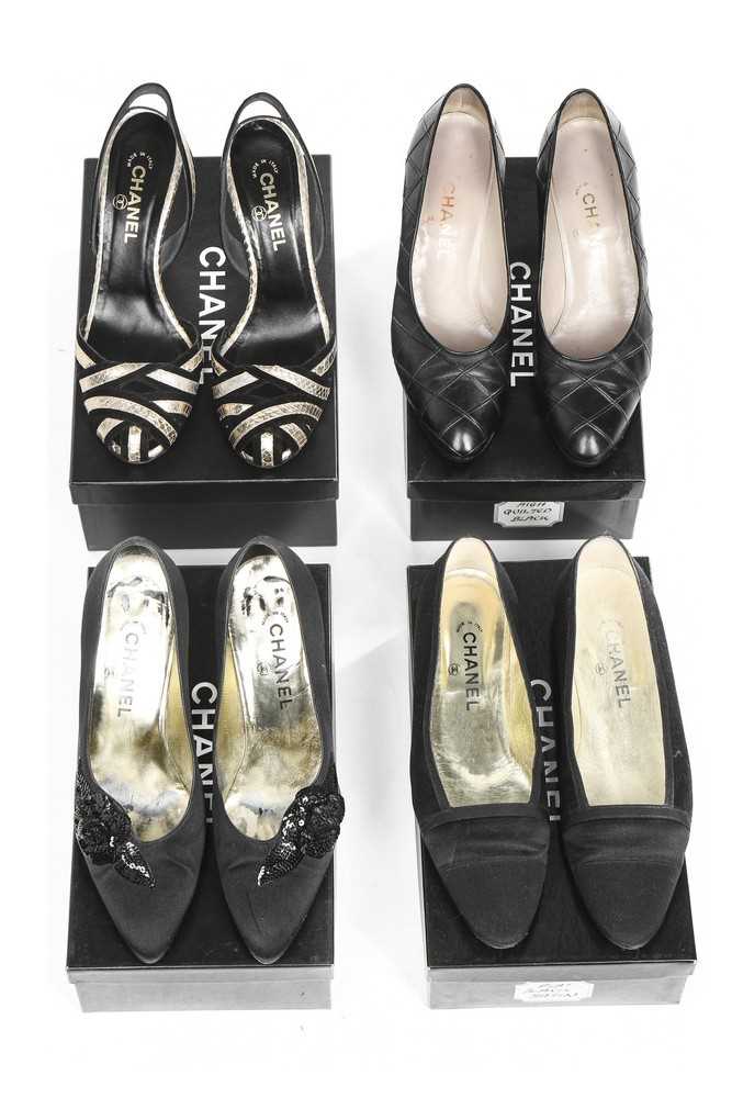 Lot 24 - Four pairs of black Chanel shoes, 1990s-modern,...