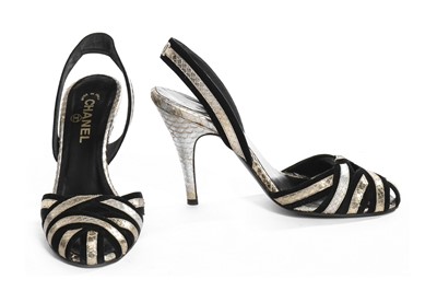Lot 24 - Four pairs of black Chanel shoes, 1990s-modern,...
