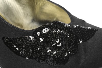 Lot 24 - Four pairs of black Chanel shoes, 1990s-modern,...