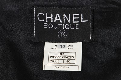 Lot 17 - A Chanel black wool jacket flecked with lurex stripes, Autumn-Winter 1995-96