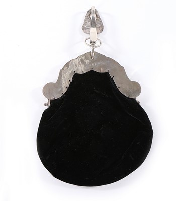 Lot 93 - A beaded purse with ornate continental silver...