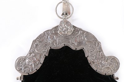 Lot 93 - A beaded purse with ornate continental silver...