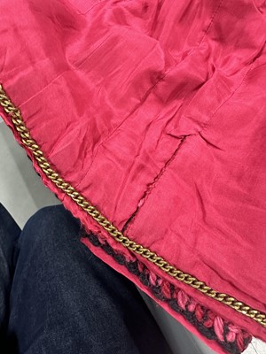 Lot 35 - A Chanel couture raspberry-pink tweed suit, circa 1960