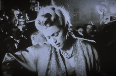 Lot 64 - Madonna's pink satin evening coat worn in the role of Eva Peron, for the film 'Evita', 1996