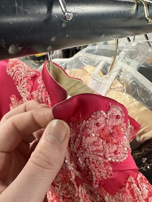 Lot 64 - Madonna's pink satin evening coat worn in the role of Eva Peron, for the film 'Evita', 1996