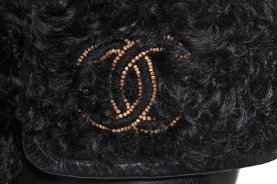 Lot 15 - A pair of Chanel black lambskin leather boots, circa 2002