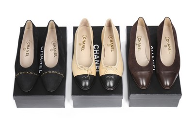 Lot 3 - Three pairs of Chanel pumps, modern, stamped...