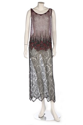 Lot 365 - A pink and black beaded tunic dress, mid 1920s,...
