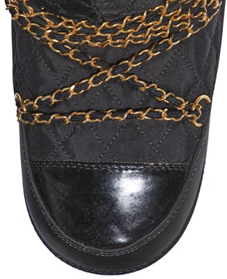 Lot 8 - A pair of Chanel chain-festooned moon boots, Autumn-Winter 1993-94