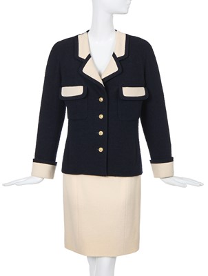 Lot 10 - A  Chanel navy and ivory bouclé wool suit, Spring-Summer 1991