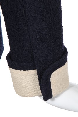 Lot 10 - A  Chanel navy and ivory bouclé wool suit, Spring-Summer 1991