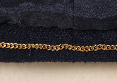 Lot 10 - A  Chanel navy and ivory bouclé wool suit, Spring-Summer 1991