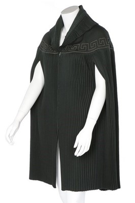 Lot 187 - A Lucien Lelong couture pleated green wool...