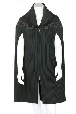 Lot 187 - A Lucien Lelong couture pleated green wool...