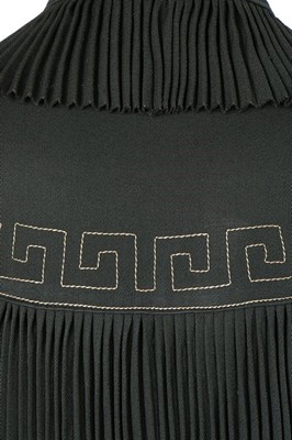 Lot 187 - A Lucien Lelong couture pleated green wool...