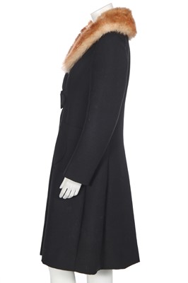 Lot 256 - A Madeleine Vramant  black wool coat, late 1960s
