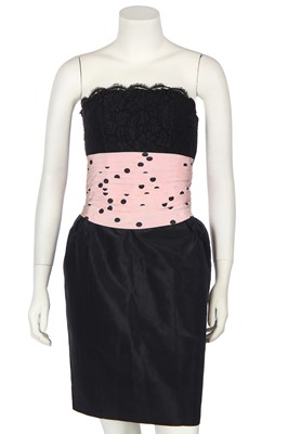 Lot 17 - A Chanel little black dress with polka-dot pink faille cummerbund, Spring-Summer 1988