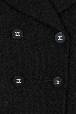 Lot 24 - A Chanel black bouclé wool suit, Autumn-Winter 1995-96