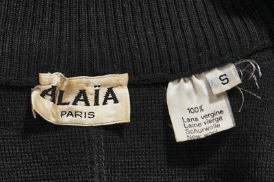 Lot 216 - An Azzedine Alaïa knitted black wool dress, circa 1989