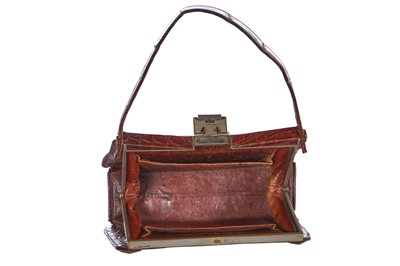 Lot 73 - 'Evita' interest: a brown crocodile handbag, circa 1945 used in the 1996 film