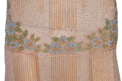 Lot 364 - A beaded peach muslin bridesmaid/flapper dress, circa 1928