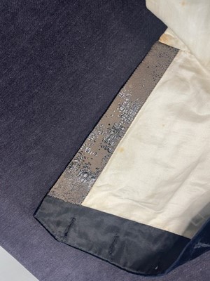 Lot 101 - Jeremy Irons: a navy velvet court livery, circa 1910, a family heirloom, donated by the actor
