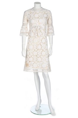 Lot 236 - A Pierre Balmain white soutache lace dress,...