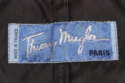 Lot 33 - A Thierry Mugler black polyester raincoat, 1980s