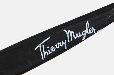 Lot 33 - A Thierry Mugler black polyester raincoat, 1980s