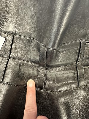 Lot 141 - A Hardy Amies man's black leather waist cincher, 1990s-2000s