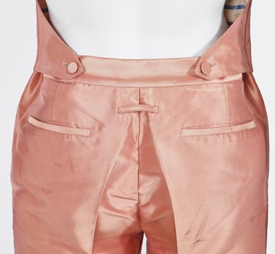Lot 132 - A Jean Paul Gaultier man's pink Mikaido silk-blend halter neck jumpsuit, 'Tribute to Frida Kahlo/Flamenco' collection, Spring-Summer 1998
