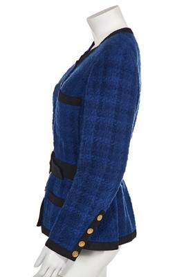 Lot 1 - A Chanel blue and black bouclé tweed jacket, 1989