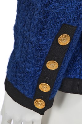 Lot 1 - A Chanel blue and black bouclé tweed jacket, 1989
