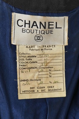 Lot 1 - A Chanel blue and black bouclé tweed jacket, 1989