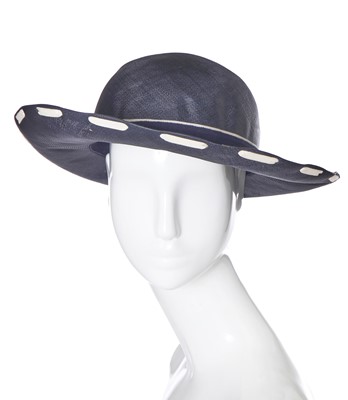 Lot 10 - A pair of Chanel shoes and a Chanel hat, late 1980s-early 1990s