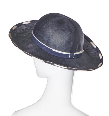 Lot 10 - A pair of Chanel shoes and a Chanel hat, late 1980s-early 1990s