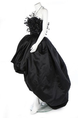 Lot 307 - A Nina Ricci couture black satin ballgown,...