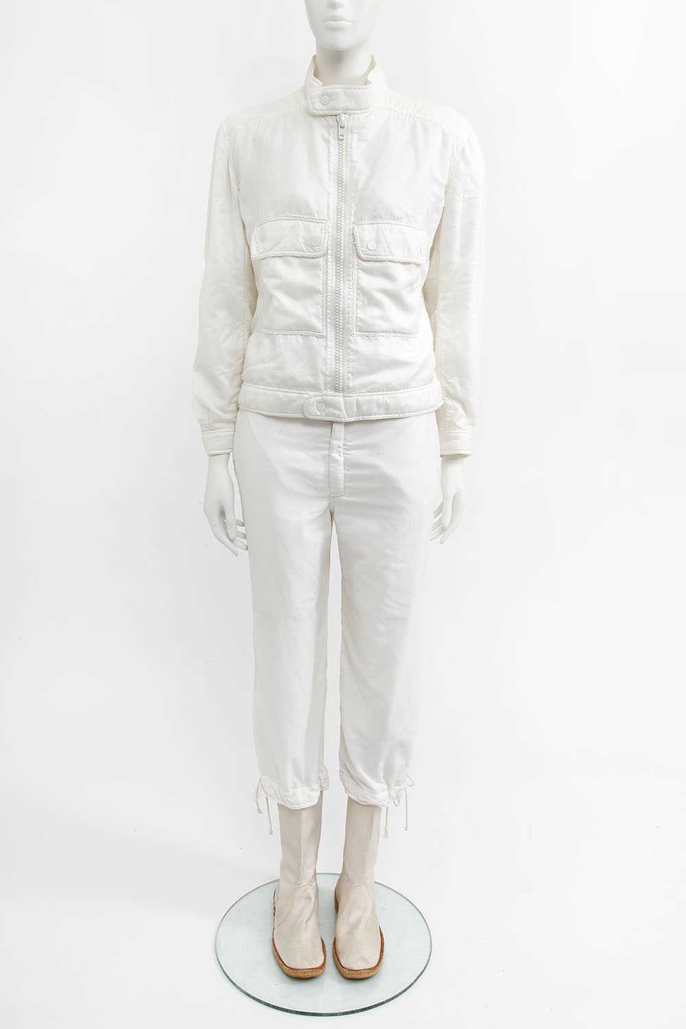 Lot 28 - A Courrèges men's white nylon ensemble, late 1970s or early 80s