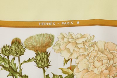 Lot 24 - Three Hermès printed silk scarves