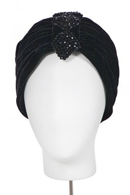 Lot 326 - A group of black and white designer clothing, 1950s and later