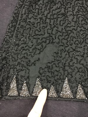 Lot 369 - A black beaded flapper dress, circa 1928