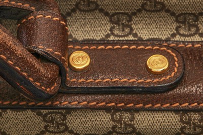 Lot 23 - A group of Gucci suitcases, 1970s - 1980s