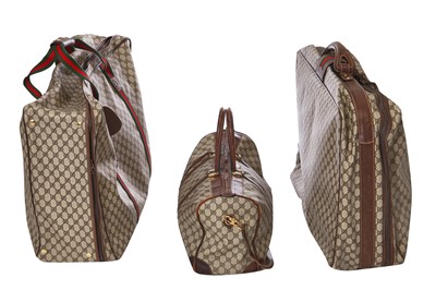 Lot 23 - A group of Gucci suitcases, 1970s - 1980s