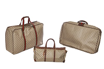 Lot 23 - A group of Gucci suitcases, 1970s - 1980s