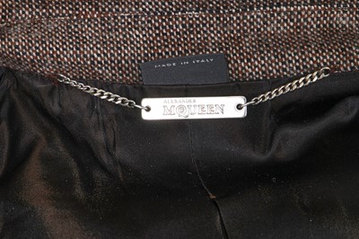 Lot 60 - An Alexander McQueen wool skirt suit, 'The Man Who Knew Too Much' Autumn-Winter 2005-06