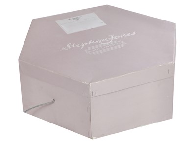 Lot 64 - An Alexander McQueen ivory skirt suit and hat, commercial collection, 2006